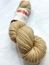 Jade Sapphire 8 Ply Cashmere Yarn in Gobi color, soft and luxurious cashmere fiber displayed in a close-up shot.