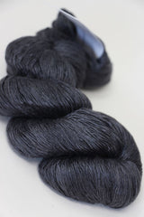 Artyarns Ensemble Light cashmere yarn in F Series colors, showing a close-up of the soft, multicolored skein with vibrant hues.