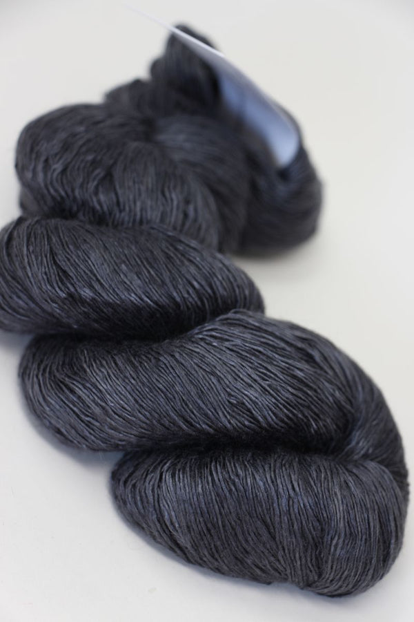 Artyarns Ensemble Light cashmere yarn in F Series colors, showing a close-up of the soft, multicolored skein with vibrant hues.
