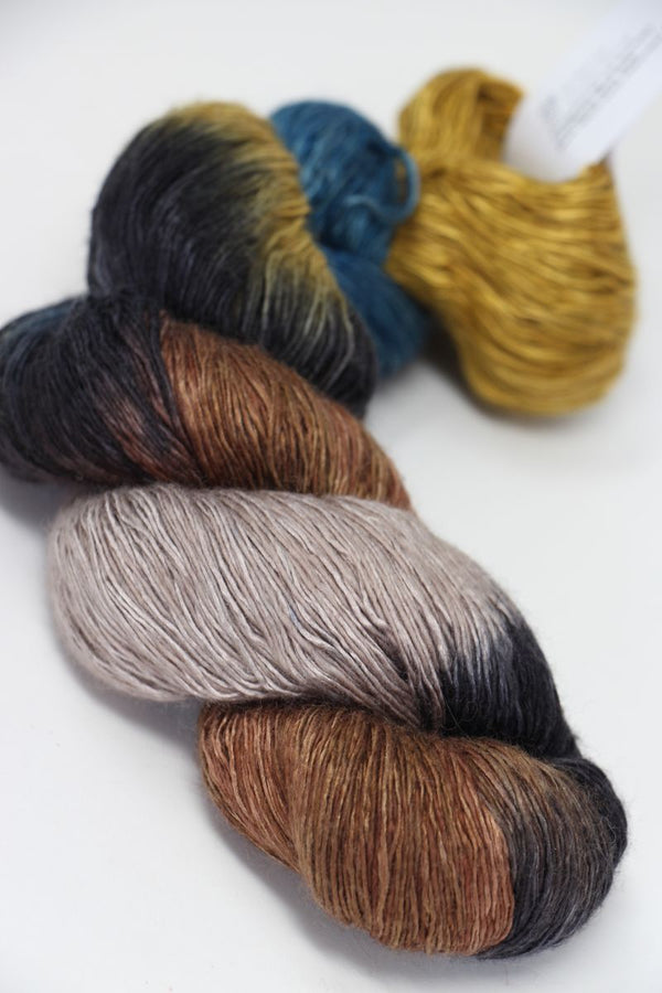 Soft Artyarns Ensemble Light cashmere yarn in F Series colors, showcasing a variety of vibrant fiber shades and textures.