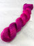 Close-up of Artyarns Regal Silk Yarn H Series highlighting its smooth, glossy silk texture and vibrant color variations.