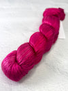 Close-up of Artyarns Regal Silk Yarn H Series in vibrant highlights, showcasing the luxurious silk texture and colorful fiber strands.