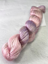 Artyarns Regal Silk Yarn H Series with vibrant highlights, showcasing luxurious silk yarn in a close-up view.