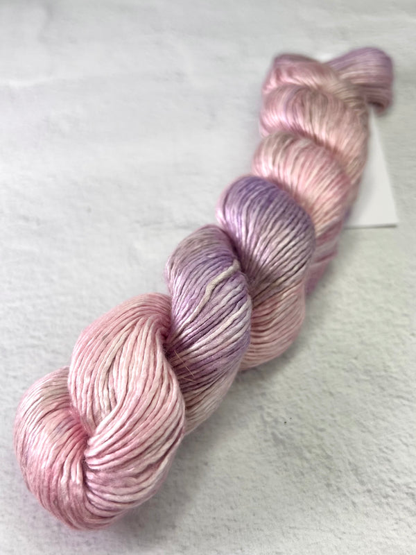 Artyarns Regal Silk Yarn H Series with vibrant highlights, showcasing luxurious silk yarn in a close-up view.