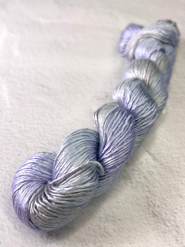 Artyarns Regal Silk Yarn H Series, close-up of luxurious silk yarn with rich highlights and vibrant colors.