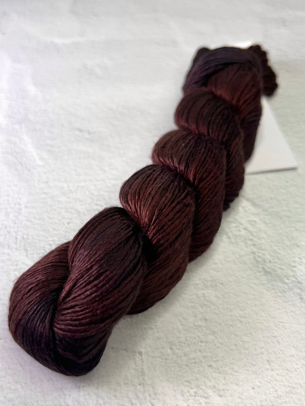 Artyarns Regal Silk Yarn H Series in vibrant highlight shades, close-up of soft silk fibers and colorful yarn highlights.