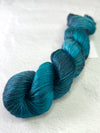 Close-up of Artyarns Regal Silk Yarn H Series in shade 7116D71A-361D-4AD7-BC99-B9A8A694CD3E, showcasing silky texture and vibrant highlights.