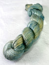 Close-up of Artyarns Regal Silk Yarn H Series in vibrant, silky fibers with rich color highlights and smooth texture.