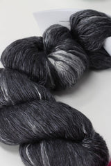 Artyarns Ensemble Light yarn in Cosmic Colors from the H Series, showcasing vibrant, multicolored fiber for knitting or crochet projects.