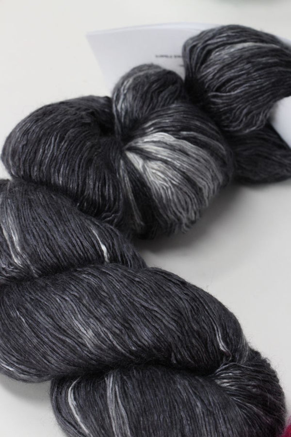 Artyarns Ensemble Light yarn in Cosmic Colors from the H Series, showcasing vibrant, multicolored fiber for knitting or crochet projects.