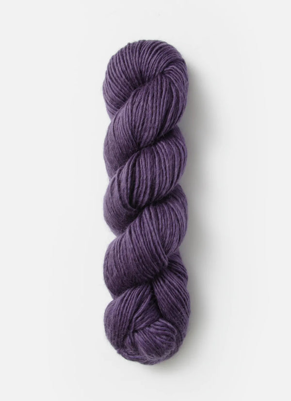 Blue Sky Fibers Suri Merino alpaca and merino yarn in soft blue, showing the smooth, luxurious fiber texture.