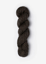 Blue Sky Fibers Baby Alpaca Sport Weight alpaca yarn in Melange 800 Series, featuring soft, heathered fibers and vibrant blue hues.