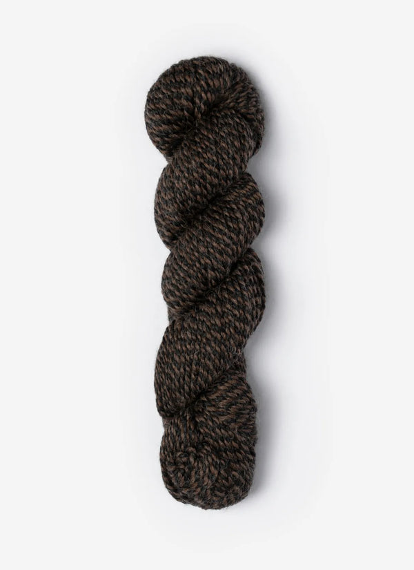 Blue Sky Fibers Baby Alpaca Sport Weight alpaca yarn in Melange 800 Series, featuring soft, heathered fibers and vibrant blue hues.