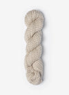 Blue Sky Fibers Baby Alpaca Sport Weight Melange yarn, soft and luxurious alpaca fiber in a natural blend, showcased in a close-up image.