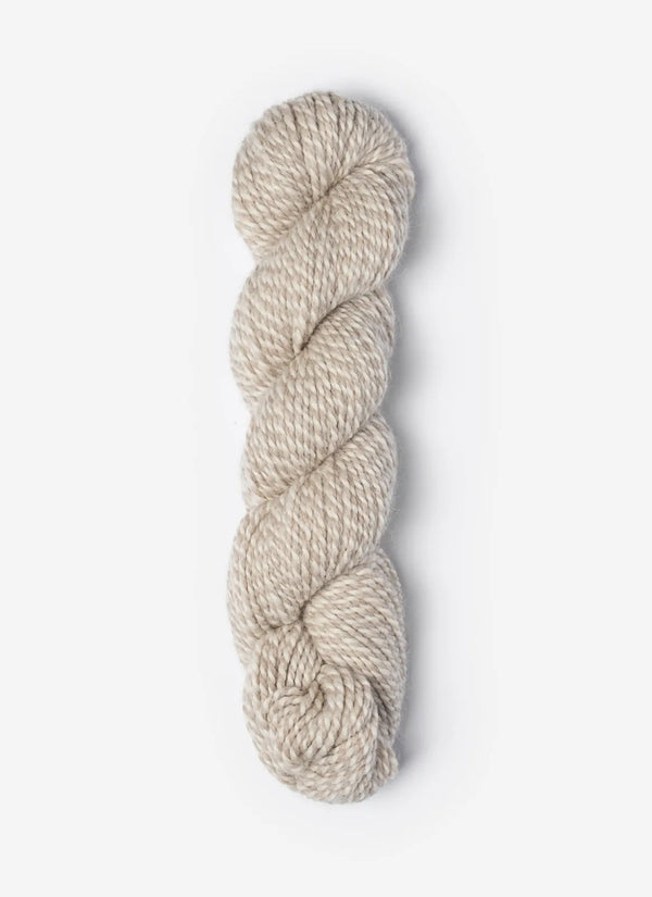 Blue Sky Fibers Baby Alpaca Sport Weight Melange yarn, soft and luxurious alpaca fiber in a natural blend, showcased in a close-up image.