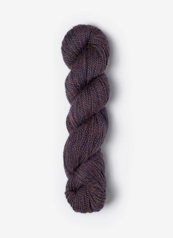 Blue Sky Fibers Baby Alpaca Sport Weight Melange alpaca yarn in a soft, multicolored blend, showcasing its smooth texture and vibrant hues.
