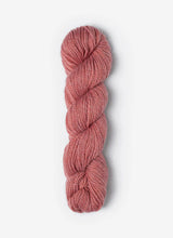 Blue Sky Fibers Baby Alpaca Sport Weight Melange yarn in soft, colorful alpaca fiber, showcasing a textured yarn skein.