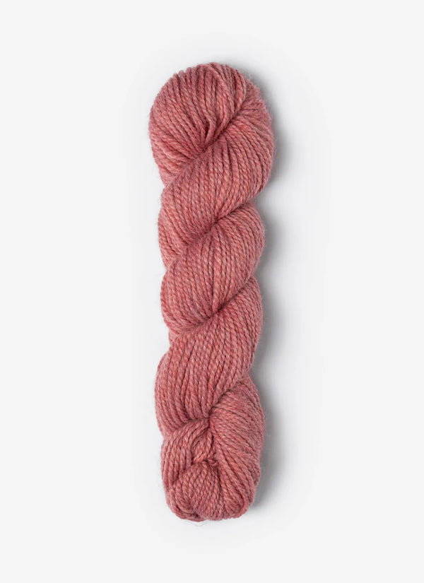Blue Sky Fibers Baby Alpaca Sport Weight Melange yarn in soft, colorful alpaca fiber, showcasing a textured yarn skein.