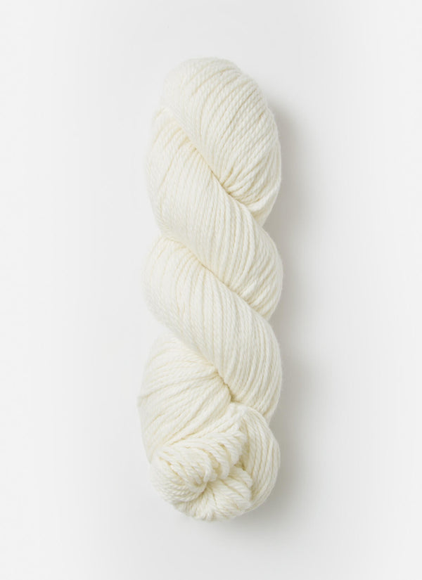 Blue Sky Fibers Sweater Worsted Superwash knitting yarn in a soft blue color, showing a close-up of the wool and cotton blend fiber strands.