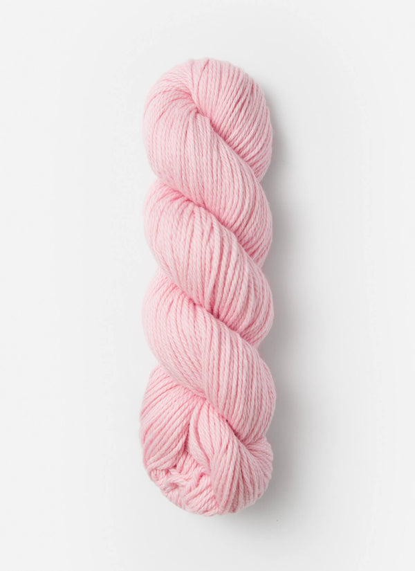 Blue Sky Fibers Sweater Worsted Superwash knitting yarn in soft blue, featuring wool and cotton blend, displayed in a skein.