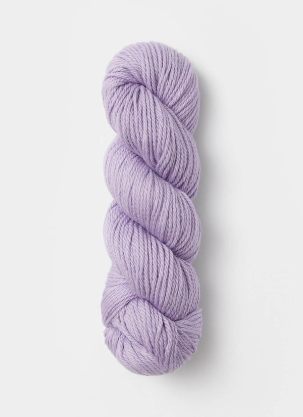 Blue Sky Fibers Sweater Worsted Superwash knitting yarn in soft blue, showing the smooth, twisted wool and cotton fibers.