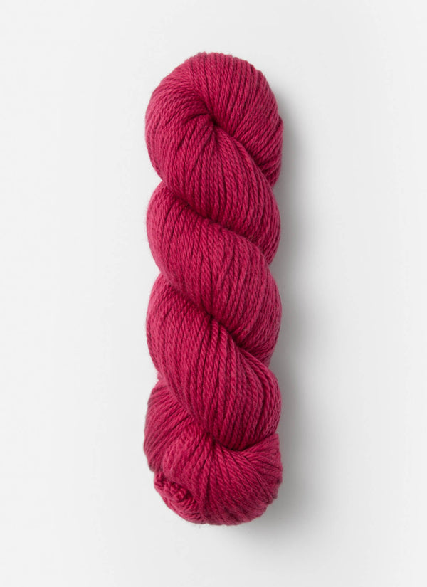 Blue Sky Fibers Sweater Worsted Superwash knitting yarn in soft blue, featuring wool and cotton blend, displayed in a close-up image.