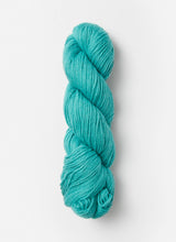 Blue Sky Fibers Sweater Worsted Superwash knitting yarn in soft wool and cotton blend, shown in a skein with vibrant blue color.