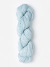 Blue Sky Woolstok Light wool yarn in cast iron color, displayed with Leaf Wrap knit kit by Blue Sky Fibers.
