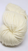 Cascade Yarns Magnum bulky yarn in an anise flower color, showcasing thick, soft yarn strands ideal for knitting and crochet projects.
