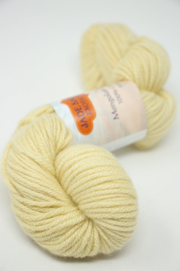 Jade Sapphire 8 Ply Cashmere yarn in a soft jasmine color, showcasing luxurious cashmere fibers and texture.