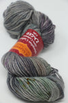 Jade Sapphire Zageo 6 Ply Cashmere yarn in Earth Gray color, showcasing soft, luxurious cashmere fibers on the skein.