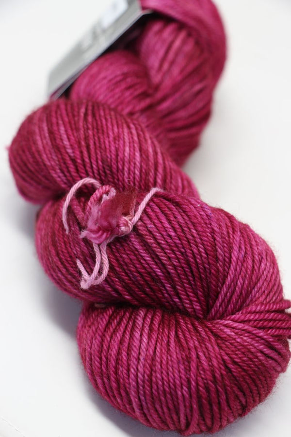 MadelineTosh Vintage Merino Wool Yarn in coquettedeux color, soft and textured for knitting or crochet projects.
