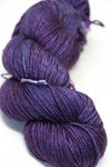 Madeline Tosh Vintage Merino Wool Yarn in Flashdance color, showing soft, colorful yarn skein with vibrant pink, purple, and blue hues.