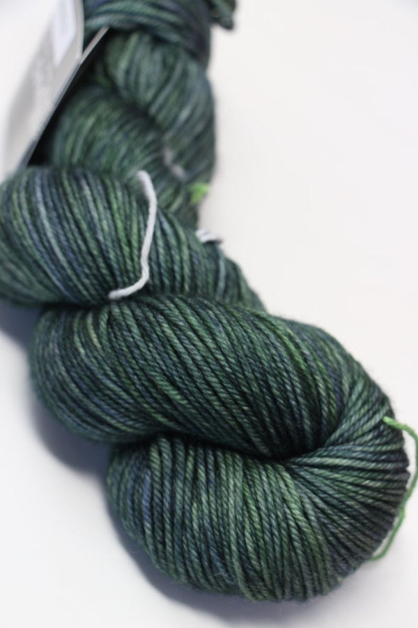 MadelineTosh Vintage Merino Wool Yarn in Fir Wreath color, soft and textured, ideal for knitting and crochet projects.
