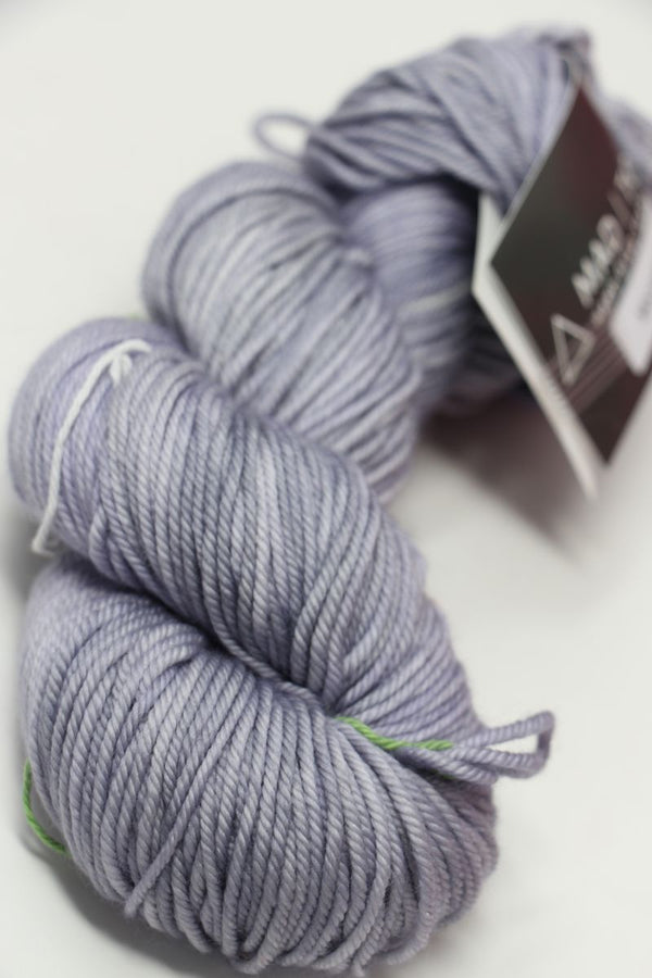 Madeline Tosh Vintage Merino Wool Yarn in Moonstone color, showing soft, textured yarn with subtle color variations.