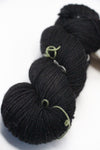 MadelineTosh vintage merino wool yarn in onyx black, showcasing soft, high-quality yarn with subtle color variations.