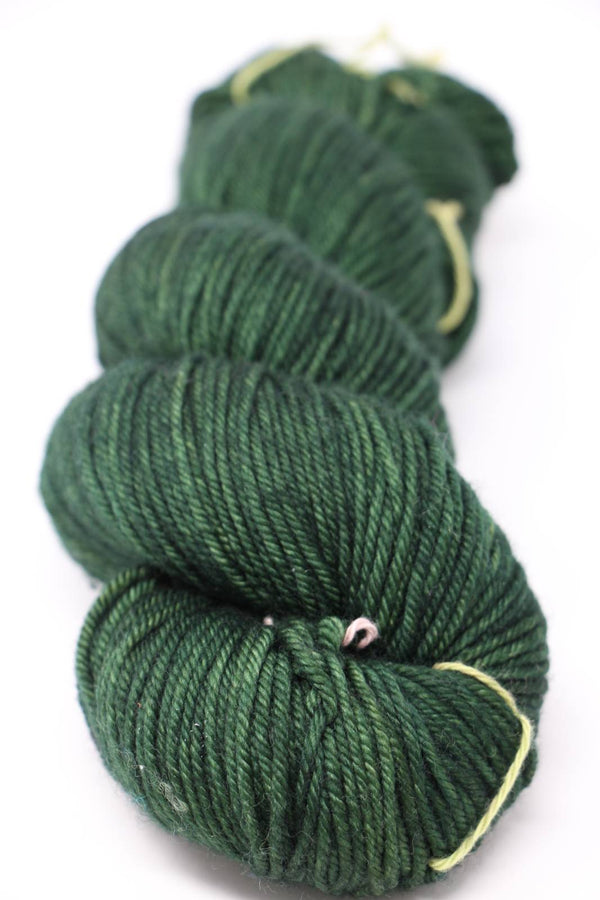 MadelineTosh Vintage Merino Wool Yarn in Moorland color, soft and textured, ideal for knitting and crochet projects.