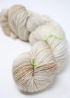 Madeline Tosh Vintage Merino Wool Yarn in natural color, showcasing soft, textured fibers ideal for knitting or crochet projects.