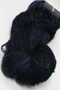 Madeline Tosh Vintage Merino Wool Yarn in Light Ink color, soft and textured wool skein for knitting or crochet projects.