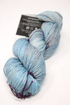 Soft, cloud-colored Madelinetosh Tosh DK yarn skein in a cozy, neutral shade, showcasing the vibrant, high-quality wool texture.