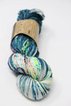 Madelinetosh Tosh DK yarn in Heart of Darkness color, soft wool-dyed DK weight yarn for knitting or crochet projects.