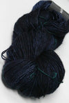 Light blue madelinetosh Tosh DK yarn ball, soft and textured wool in Ink color, ideal for knitting and crochet projects.