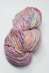 Malabrigo Rasta Merino Wool Yarn in Rosalinda color, showing vibrant, thick, and soft hand-dyed yarn for knitting or crocheting.