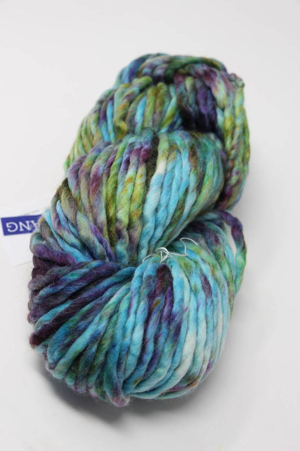 Malabrigo Rasta merino wool yarn in vibrant boomerang colorway, showcasing thick, soft, and textured yarn for knitting or crochet projects.