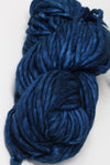 Malabrigo Rasta merino wool yarn in deep blue, showing thick, soft, hand-dyed fiber ideal for knitting and crochet projects.