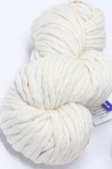 Natural Malabrigo Rasta merino wool yarn in natural color, soft and bulky with thick and thin textures.