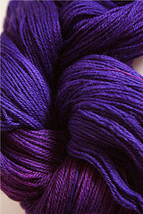 Close-up of Artyarns Merino Cloud Yarn in soft, variegated colors, showcasing its fluffy, luxurious texture and fine merino fibers.