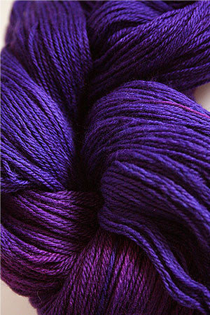 Close-up of Artyarns Merino Cloud Yarn in soft, variegated colors, showcasing its fluffy, luxurious texture and fine merino fibers.