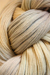 Close-up of Artyarns Merino Cloud Yarn in H Series, showcasing soft, textured merino wool fibers in natural shades.