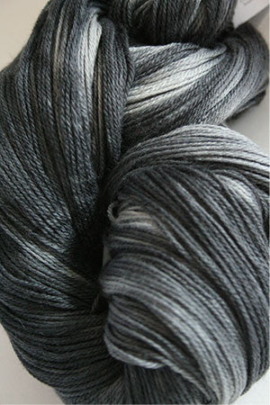 Close-up of Artyarns Merino Cloud Yarn in H Series, showcasing soft, fluffy merino wool fibers in light pastel hues.